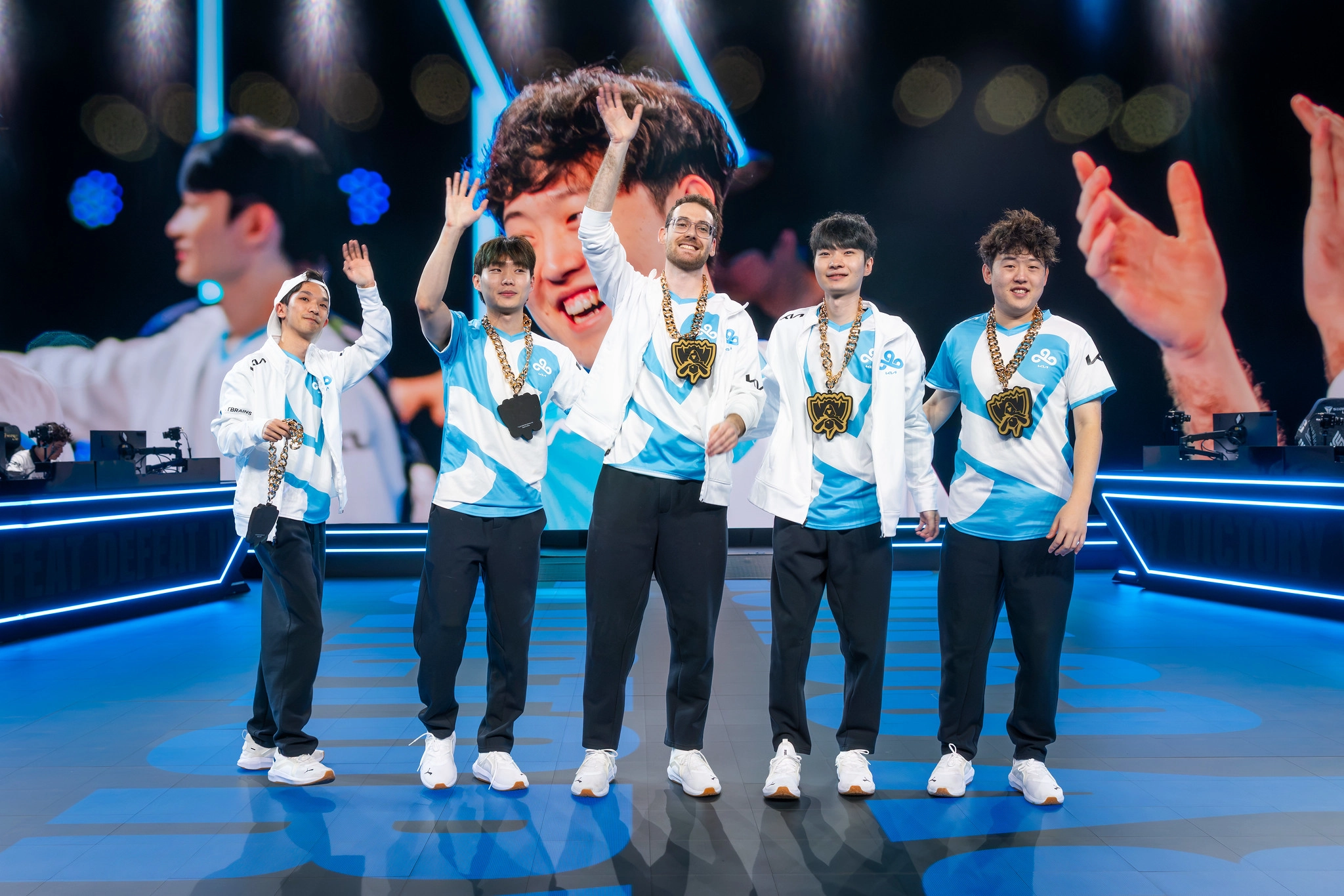 Cloud9 players greeting the audience on the Worlds stage